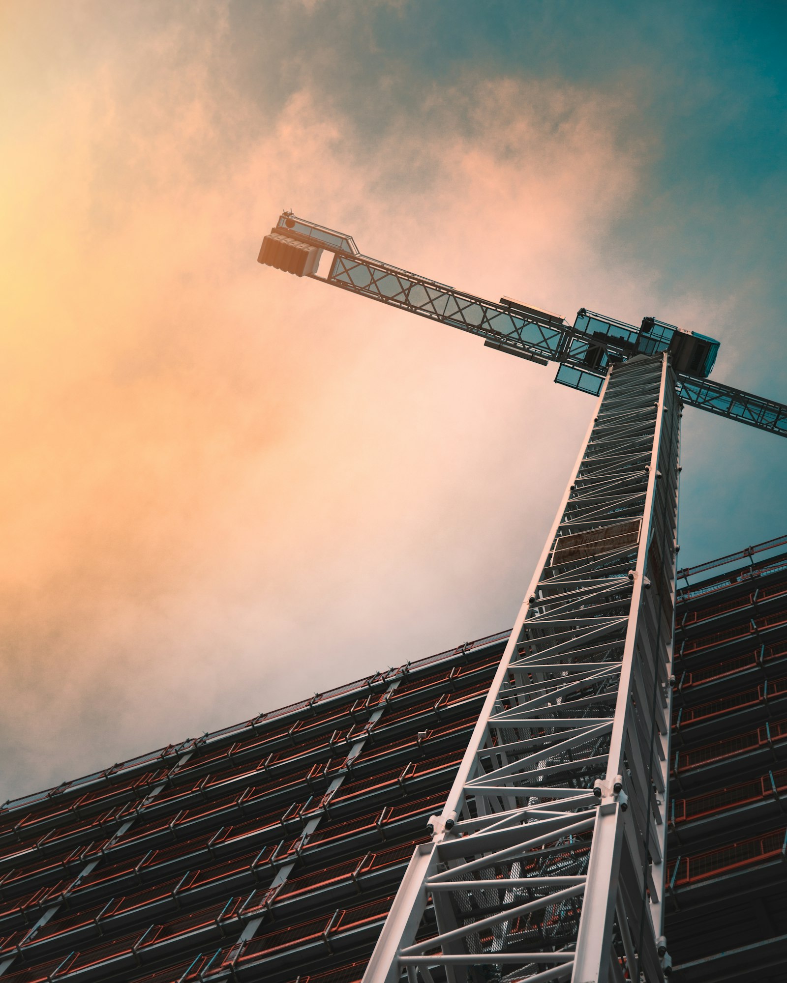Precast concrete wall panel being lifted into position on a Chennai site